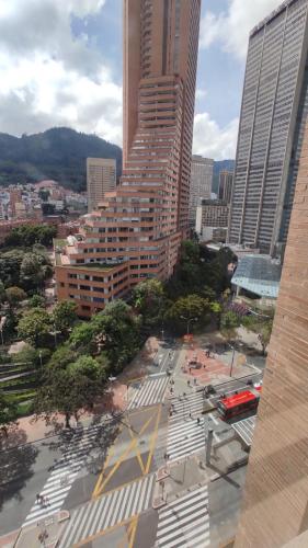 an aerial view of a city with tall buildings at ApartaSuite Centro Internacional in Bogotá