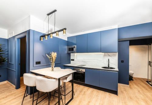 Η κουζίνα ή μικρή κουζίνα στο Ando apartments