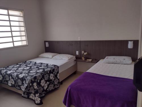 Ένα ή περισσότερα κρεβάτια σε δωμάτιο στο Hostel Sollar Campinas