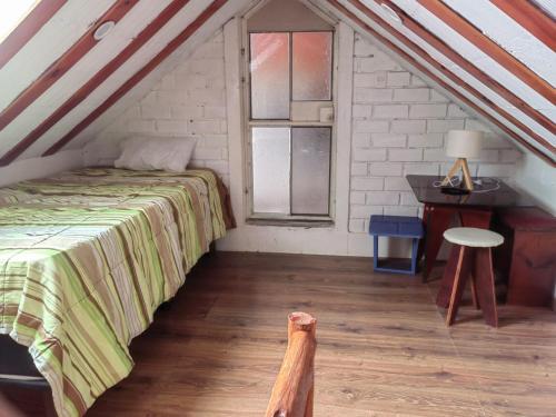 En eller flere senge i et værelse på Residencial Misky Dreams