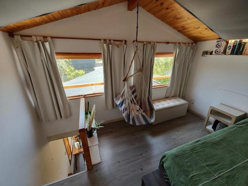 Postel nebo postele na pokoji v ubytování Cabaña Jardín del Río