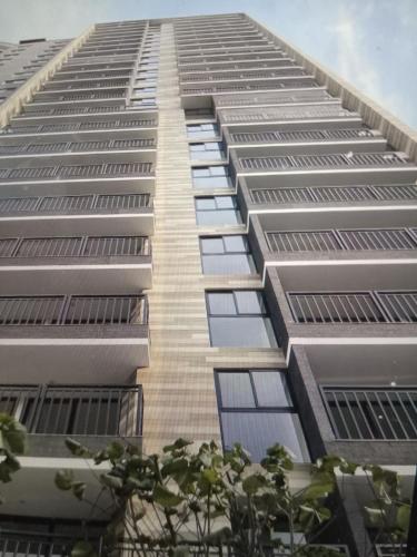 a tall building with lots of windows at Departamento Pardo Miraflores in Lima
