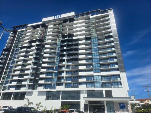 a tall building with a sign on top of it at Southport Central Two bedroom Apartment Gold Coast in Gold Coast