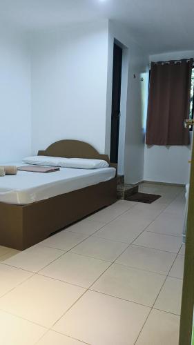 Postel nebo postele na pokoji v ubytování Alona Guest House