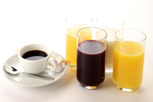 three glasses of juice and a cup of coffee at Daiichi Inn Park in Sendai