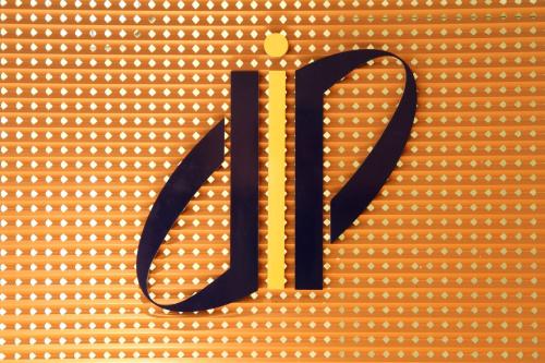 a close up of a sign with the wordjp at Daiichi Inn Park in Sendai