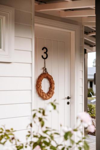 a wreath on the front door of a house at The Homestead in Berry