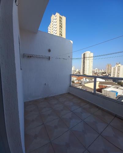 a balcony with a view of a city skyline at SETTA'S HOSTEL in Sao Paulo
