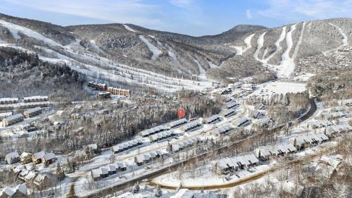 an aerial view of a train station in the mountains at L'Adirondacks in Stoneham
