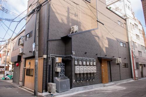 a building on a city street with a building at valuehjq VALUE NAMBA SOUTH III in Osaka