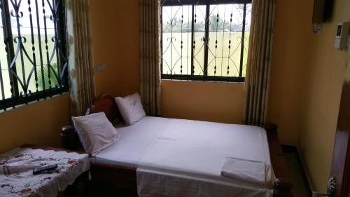 Tempat tidur dalam kamar di Mauya Executive Lodge