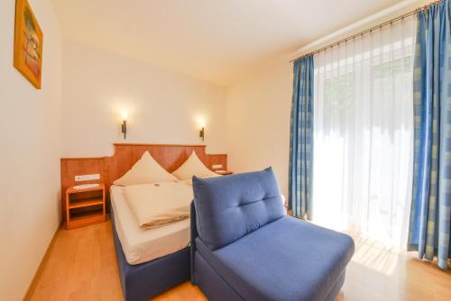 Postel nebo postele na pokoji v ubytování Hotel Waldhof