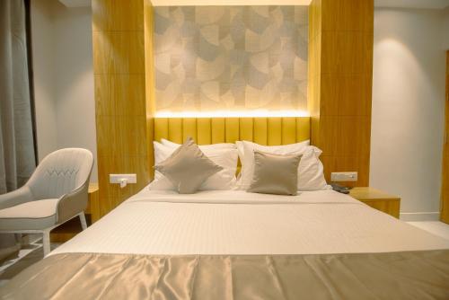 Postel nebo postele na pokoji v ubytování Hotel DC Star, Kolkata