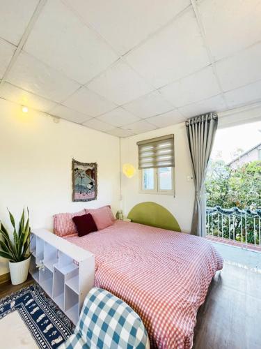 Katil atau katil-katil dalam bilik di Chái Nho Homestay