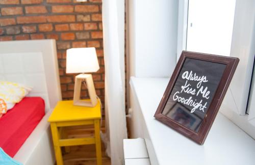 Ένα ή περισσότερα κρεβάτια σε δωμάτιο στο Loft Rooms - centrum - bezpłatny parking