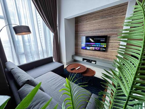 SRH EVO Duplex Suitesにあるテレビまたはエンターテインメントセンター