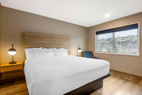 Postel nebo postele na pokoji v ubytování Columbia River Hotel, Ascend Hotel Collection