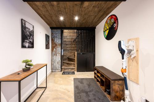 a room with a hallway with a wooden ceiling at Bienvenue Chez Les Trutes in Modane