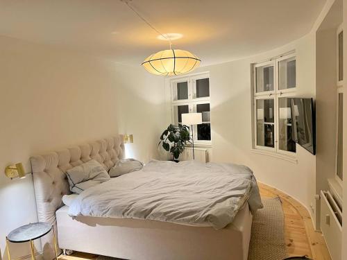 Ένα ή περισσότερα κρεβάτια σε δωμάτιο στο High-end Apartment in Central Copenhagen