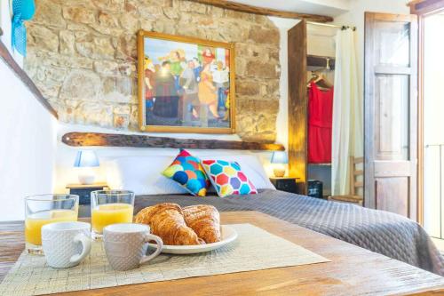 En eller flere senge i et værelse på Le Fanciulle - Alexandra