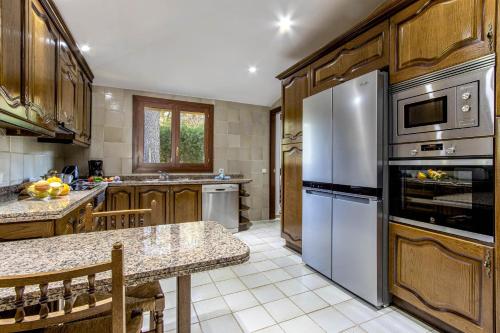 Kuchyň nebo kuchyňský kout v ubytování Villa Formosa