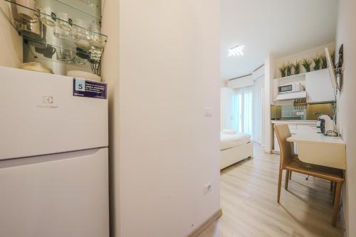 Kuchyň nebo kuchyňský kout v ubytování Cristel Apartment - 15 min da Milano