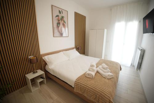 Katil atau katil-katil dalam bilik di B&B Alèsia