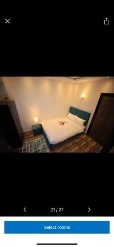 Postel nebo postele na pokoji v ubytování Pyramids vew hotel