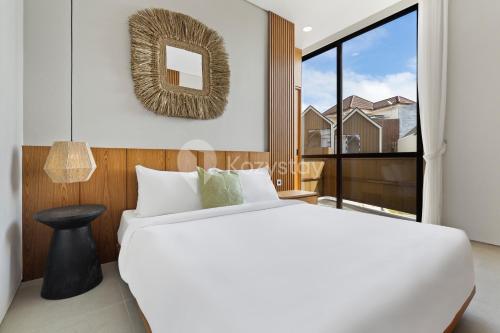 Giường trong phòng chung tại Tivara Villa by Kozystay - Jimbaran