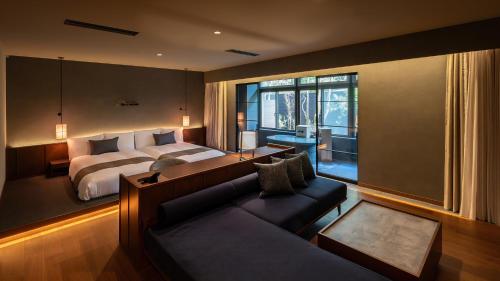 Postel nebo postele na pokoji v ubytování Nasu-Onsen Shinshun no Kago Hewitt Resort