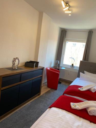 Postel nebo postele na pokoji v ubytování Viadrina Rooms & Apartments Frankfurt-Oder am Park im Zentrum