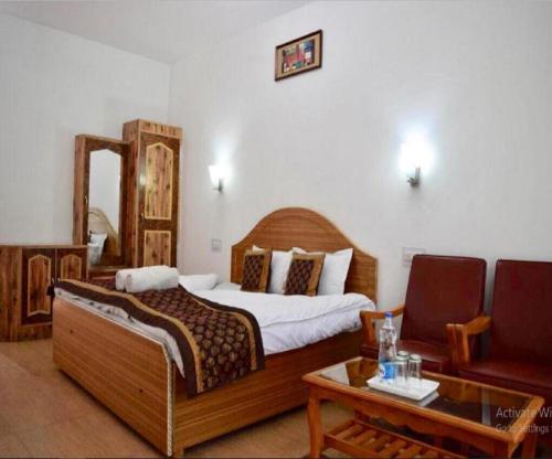 Postel nebo postele na pokoji v ubytování Hotel D'Zojila