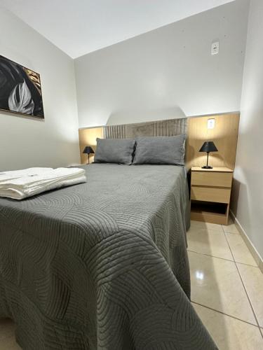 Postel nebo postele na pokoji v ubytování Charmoso apartamento na terra do Talian!