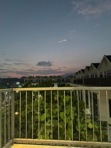 a view from the balcony of a condo at night at Liverpool House Mộc Châu in Mộc Châu