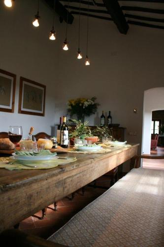 a table with plates of food on top of it at Podere Marella in I Pieracci