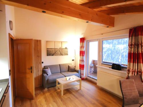 Posezení v ubytování Apartment Piz Munschuns by Interhome