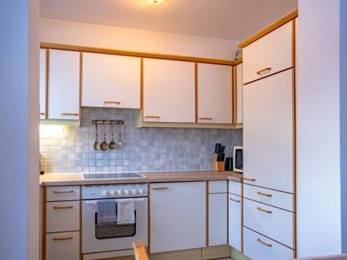 Η κουζίνα ή μικρή κουζίνα στο Apartment Bichleregg by Interhome