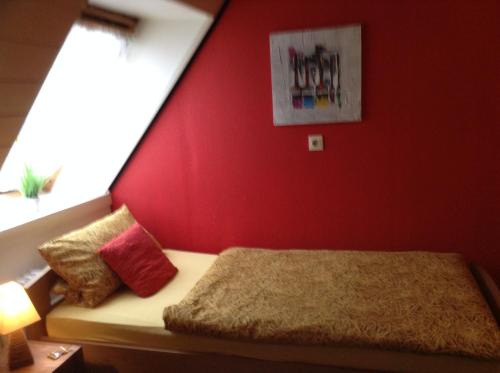 Postel nebo postele na pokoji v ubytování Gasthof Altes Farmhaus und Apartment