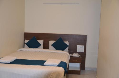 Ένα ή περισσότερα κρεβάτια σε δωμάτιο στο SV Dream Stay