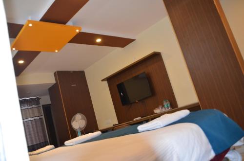 Ένα ή περισσότερα κρεβάτια σε δωμάτιο στο SV Dream Stay