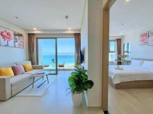 Postel nebo postele na pokoji v ubytování Căn Hộ Du Lịch The Sóng Vũng Tàu - Nhi Homestay