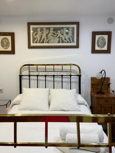 Ένα ή περισσότερα κρεβάτια σε δωμάτιο στο Casa Rural Fray Eloy