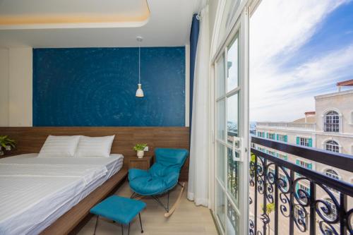 Postel nebo postele na pokoji v ubytování Tiamo Hotel