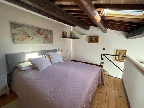 Ένα ή περισσότερα κρεβάτια σε δωμάτιο στο Elena Casa Turistica