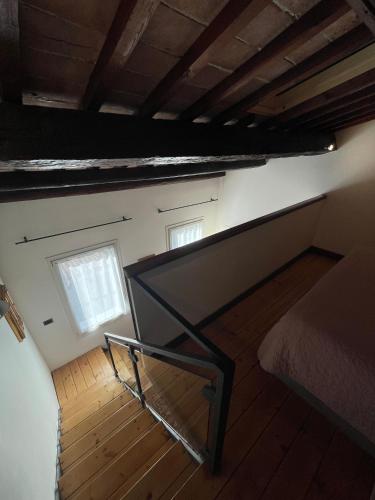 Ένα ή περισσότερα κρεβάτια σε δωμάτιο στο Elena Casa Turistica