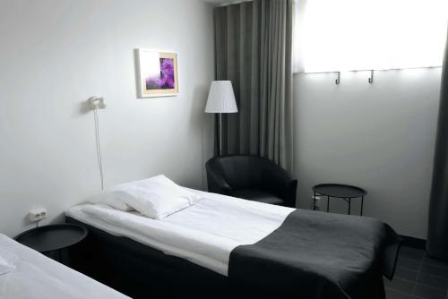 Cama o camas de una habitación en Best Western Centralhotellet
