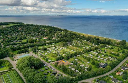 an aerial view of a park next to the ocean at First Camp Ajstrup Strand in Malling