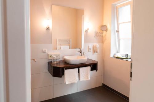 Postel nebo postele na pokoji v ubytování Villa Linnenschmidt Apartments in zentraler Lage Bremen