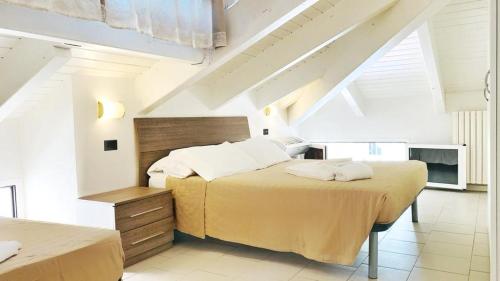 Ένα ή περισσότερα κρεβάτια σε δωμάτιο στο Residence Altea