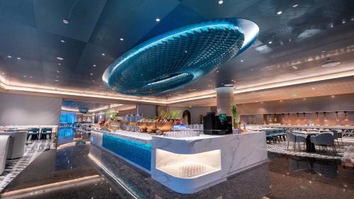 Πισίνα στο ή κοντά στο Hainan Sangem Moon Hotel